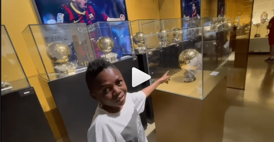 yaw-dabo-visits-barcelona-museum,-jokes-about-messi’s-ballon-d’or-on-display