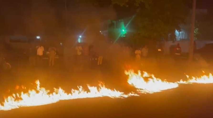 photos-and-videos:-ndc-supporters-face-off-with-police;-burn-car-tyres-on-streets-of-cantonments