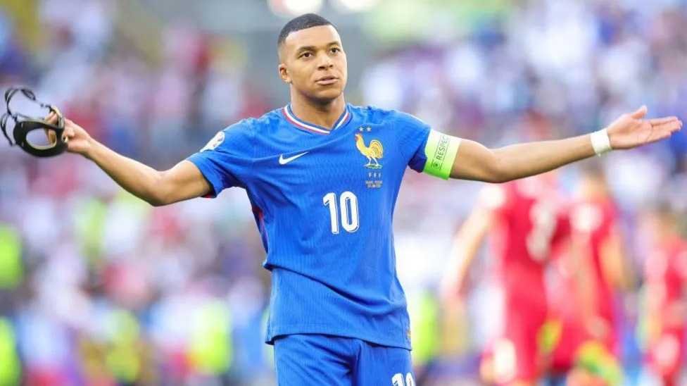 france-held-to-draw-by-poland-despite-mbappe’s-goal